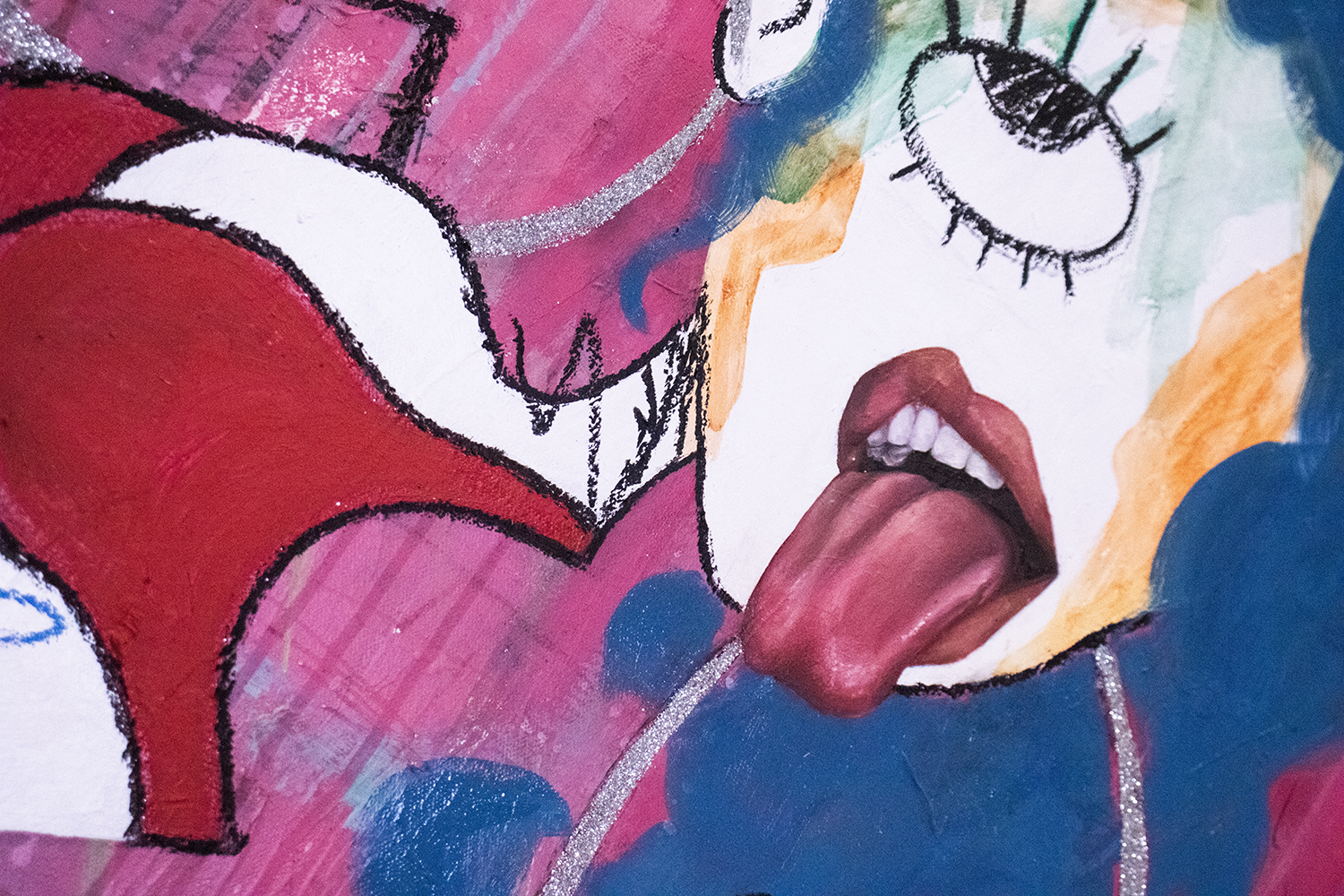 Colorful abstract painting with exaggerated facial features